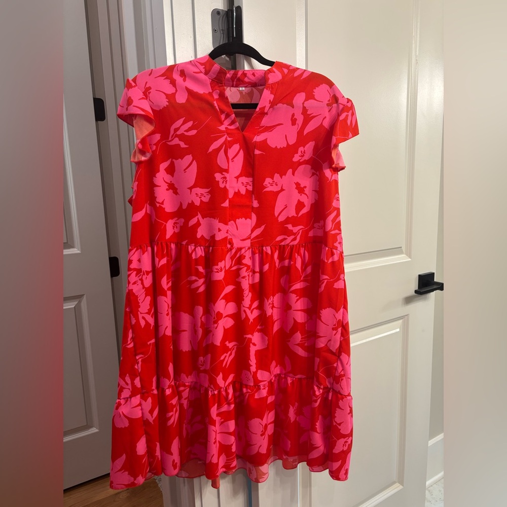 Ladies dress size 2x.  Only worn once.  Red and pink colors.